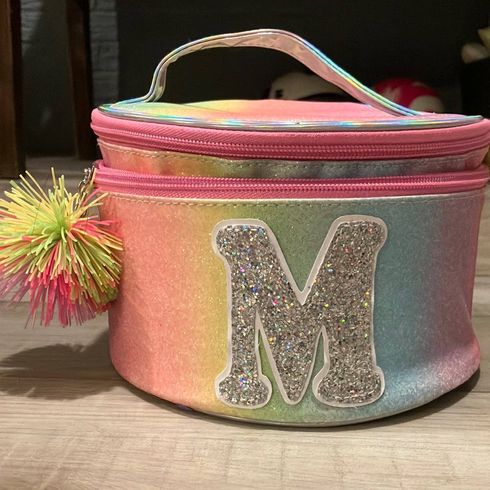 Justice monogramed “M” makeup case